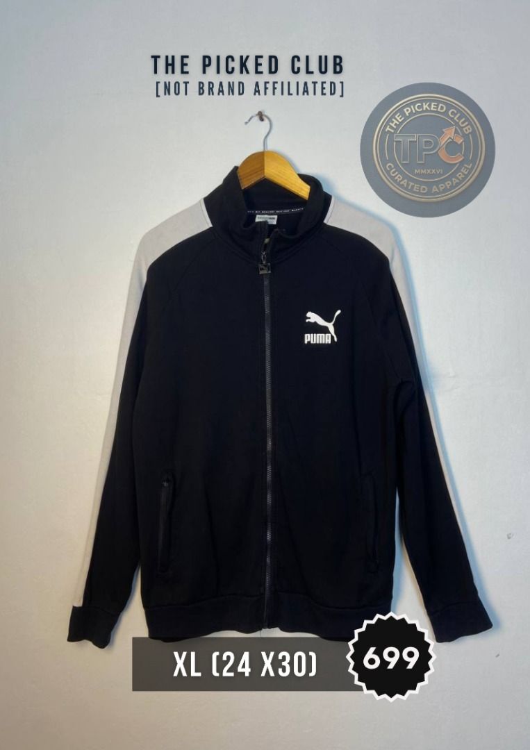 Puma Track Jacket XL Black White (Category: Coats, Jackets and Outerwear) located in Imus. Submitted by thepickedclub (Listing ID 1459999692, Image 1). Description: xl (24 x30) - Classic Puma track jacket - Color: Black with white sleeve accents - Full zip closure - Size: XL - Measurements: 24 inches wide x 30 inches long - Ideal for casual wear or sports.
