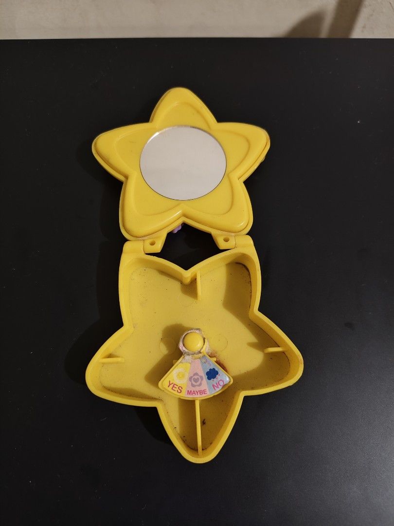 purple Care Bears Harmony Bear star-shaped folding compact mirror (Category: Character Goods) located in Bulacan. Submitted by angel.decluttersx (Listing ID 1460081525, Image 3). Description: Jollibee 2000s needs cleaning inside.