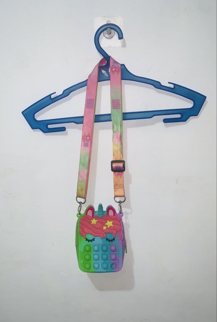 Purse (Category: Purses & Pouches) located in Pasig City. Submitted by monad13q (Listing ID 1460090391, Image 3). Description: - The Unicorn Pop It Fidget Sling Purse Lalabhan ko pa ang lace kasi natago lang para sa pamangkin nyo and kids.