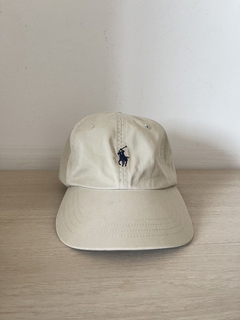 Ralph Lauren Beige Leather Strap Cap (Category: Caps & Hats) located in Gingoog City. Submitted by matcha.archive (Listing ID 1459903154, Image 1). Description: Size: One Size Fits All Color rate: 9.8/10 Condition: Excellent Issue: Dirt (seen in pic) labhan nyo nalang Plus shipping fee.