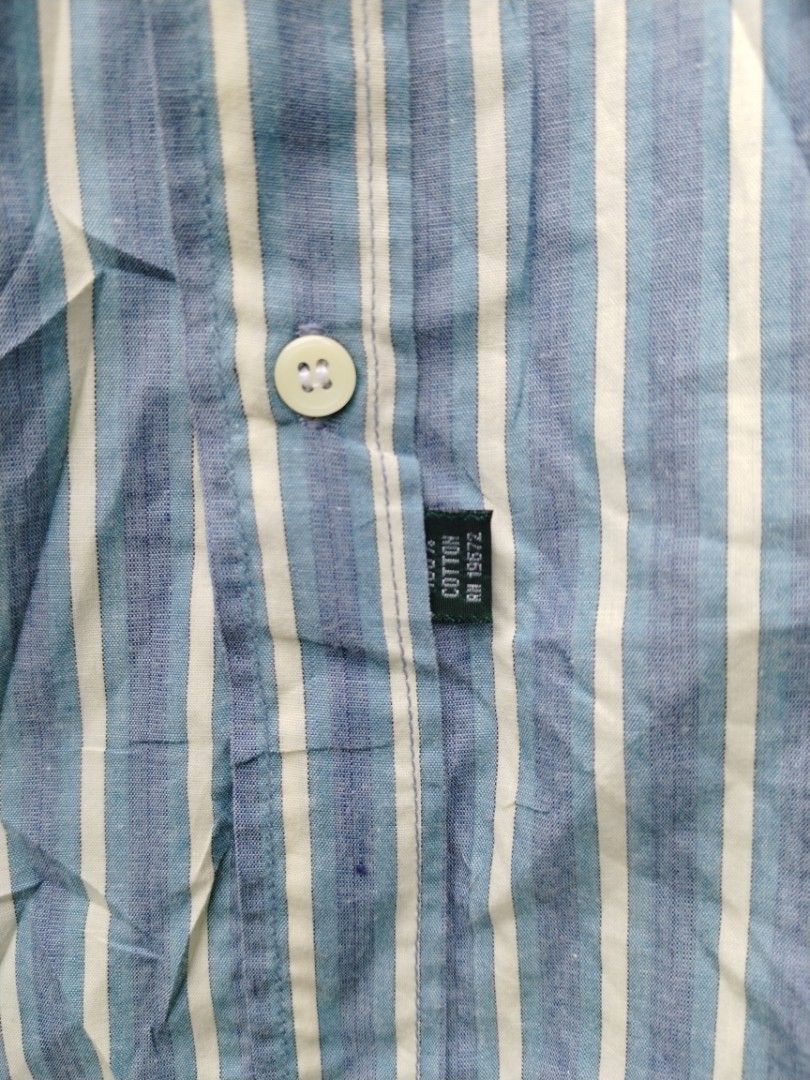Ralph Lauren longsleeve (Category: Tshirts & Polo Shirts ) located in Legazpi City. Submitted by genobecollectives (Listing ID 1459914434, Image 3). Description: - Classic blue and white striped button-up shirt - Brand: Ralph Lauren - Material: 100% Cotton - Size: 20 - Features: Embroidered logo on chest pocket - Style: Perfect for casual or smart-casual occasions Polo Ralph Lauren longsleeve 800 free ship Size 20 22 x 30 Very good condition My l