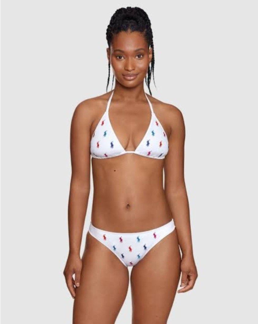 Ralph Lauren Black Two piece Bikini Set No Pads (Category: Bikinis & Swimsuits) located in Batangas. Submitted by thriftshop_izy15 (Listing ID 1459947277, Image 1). Description: - Cute black bikini set - Features colorful embroidered Polo ponies all over - Halter neck top with tie closure - Bottoms with tie sides - Ideal for beach or pool outings - Unique and eye-catching design - Size: Medium Waistline- 28" to 36".