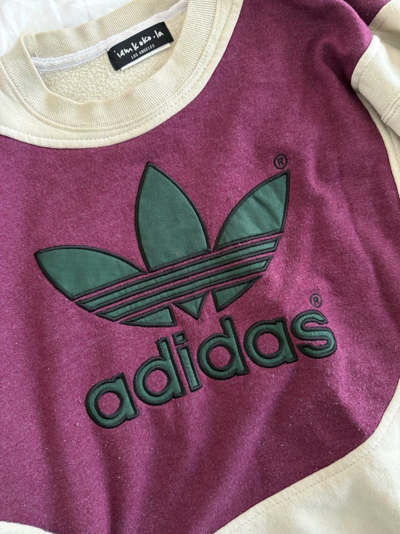rare reworked adidas sweater (Category: Longsleeves) located in Mandaluyong City. Submitted by outofstoragewtf (Listing ID 1459989424, Image 3). Description: - bought from LA for 7k - size xs - s will fit Vintage Adidas colorblock sweatshirt in a washed burgundy, cream, and forest green palette. Features an oversized trefoil logo at the front, contrast panel construction, and a relaxed slouchy fit. .
