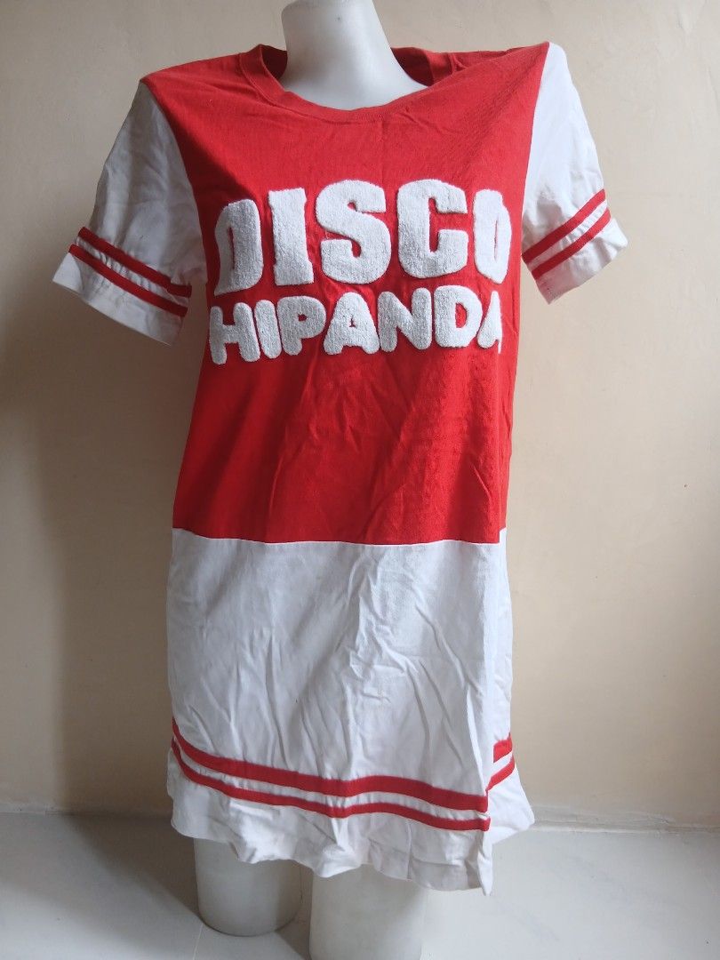 Red and White "DISCO HIPANDA" T-shirt (Category: Tshirts & Polo Shirts ) located in Tayabas. Submitted by ahrcelllego (Listing ID 1460058600, Image 1). Description: - "DISCO HIPANDA" graphic t-shirt - Red and white color scheme - Red stripes on sleeves - Fun, retro style - Comfortable cotton blend material - Ideal for casual wear or themed parties.