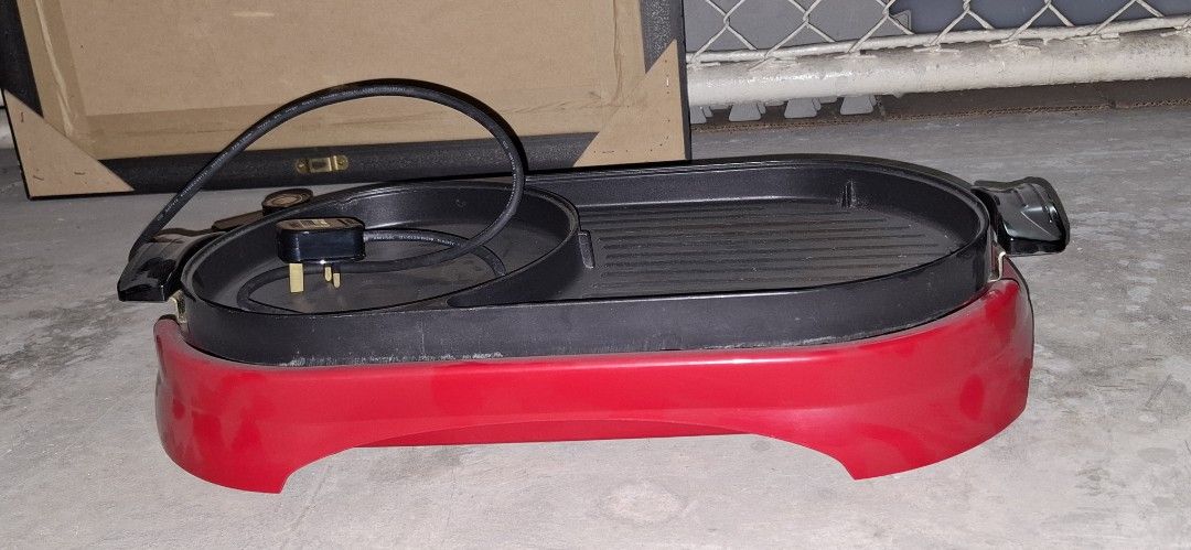 Red Electric Grill Pan with Separate Soup Pot (Category: Cookware & Accessories) located in Manila. Submitted by adaniel.81 (Listing ID 1460081537, Image 3). Description: - Electric grill pan with separate soup/broth section - Ideal for Korean BBQ or hot pot at home - Adjustable temperature control for perfect cooking - Comes with cord and plug - Ready for your next party or family gathering.