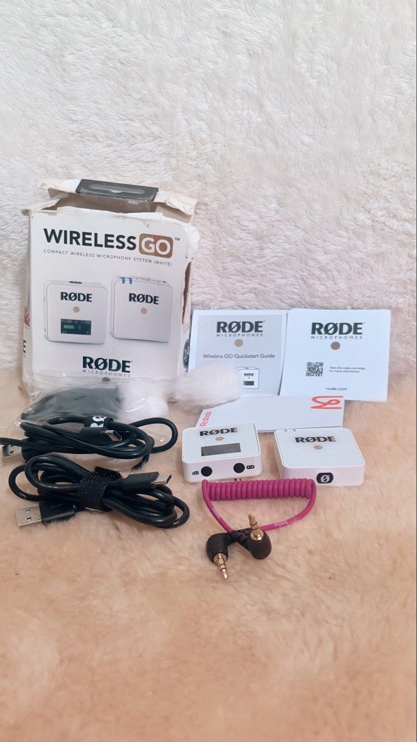 Rode Wireless GO Compact Wireless Microphone System (White) (Category: Microphones) located in Baguio. Submitted by izza_thrifty (Listing ID 1459967312, Image 1). Description: - Rode Wireless GO compact wireless microphone system - Includes transmitter and receiver units - Comes with USB-C charging cables - Includes TRS to TRRS cable - Ideal for vlogging and content creation.