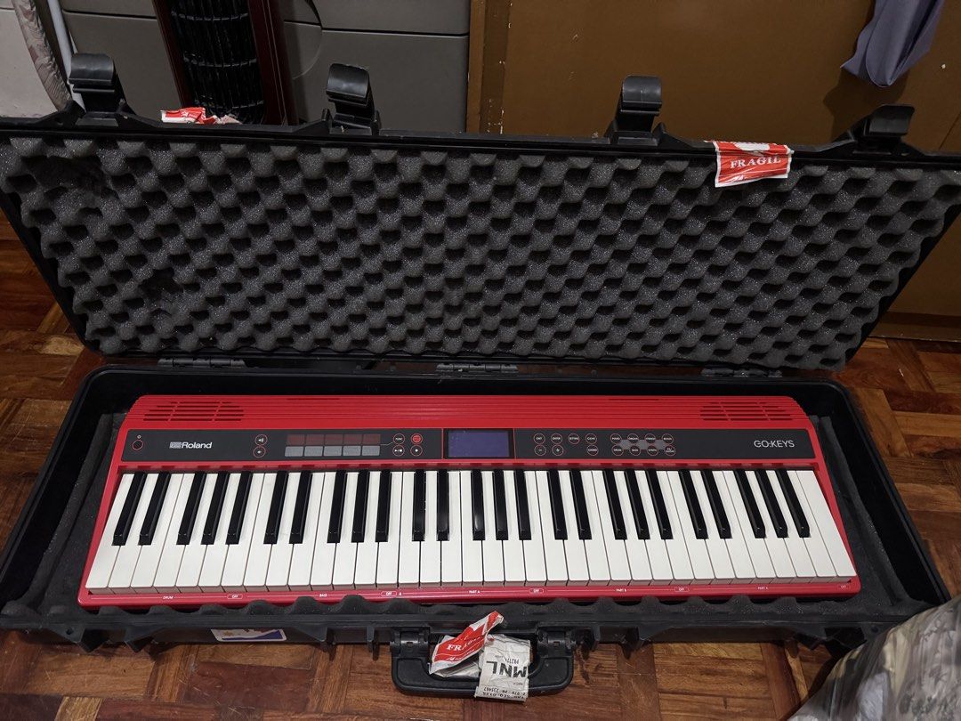 Roland GoKeys Red Keyboard in Hard Case (Category: Musical Instruments) located in Manila. Submitted by tapeyt24 (Listing ID 1460070344, Image 1). Description: For sale Roland Go keys 61 keys No issue With hardcase & orig adapter.