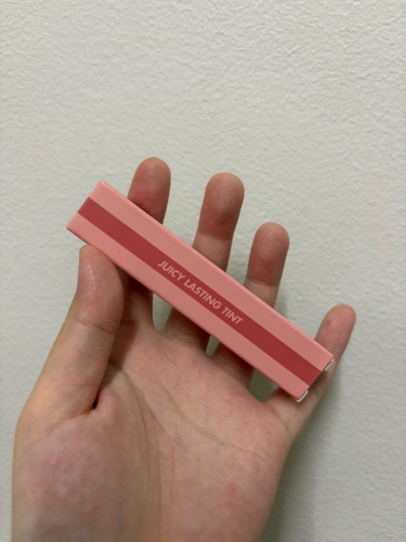Rom&nd Juicy Lasting Tint 25 Bare Grape (Category: Makeup) located in Manila. Submitted by brilliantboutique (Listing ID 1460048636, Image 1). Description: - Brand: Rom&nd - Product: Juicy Lasting Tint - Shade: 25 Bare Grape - Finish: Glossy - Wear: Long-lasting - Color: Muted grape - Ideal for: Everyday looks, subtle color.
