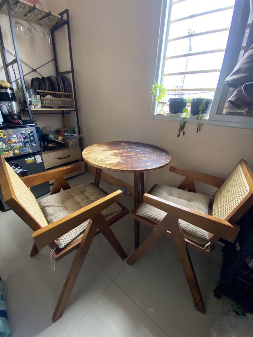 Round Table and chair (Category: Coffee & Tea Tableware) located in Imus. Submitted by joanbarr-ph (Listing ID 1459975095, Image 1). Description: Kasama po yung foam pillow for seat. Reason for selling: Need ko po ng space sa bahay for kitchenwares. Price still negotiable . Pick up or lalamove delivery na cover nyo po fee. Taguig Area.