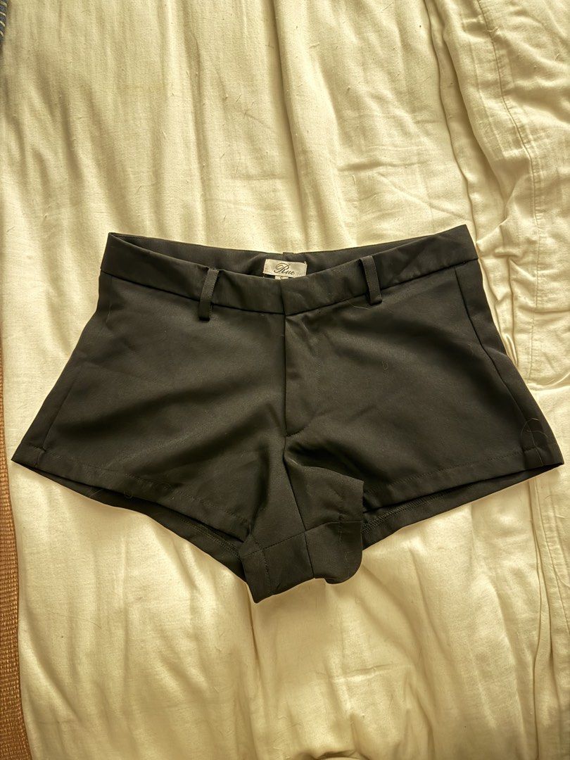 Rue Black Low Waisted Tailored Shorts (Category: Shorts) located in San Juan City. Submitted by sfvr. (Listing ID 1460093521, Image 3). Description: - Low-waisted tailored shorts - Features belt loops - Button and zip closure - Structured, flattering fit - Versatile for dressing up or down Waist: 68cm Hip: 95cm Front Length: 22cm Back Length: 25cm.