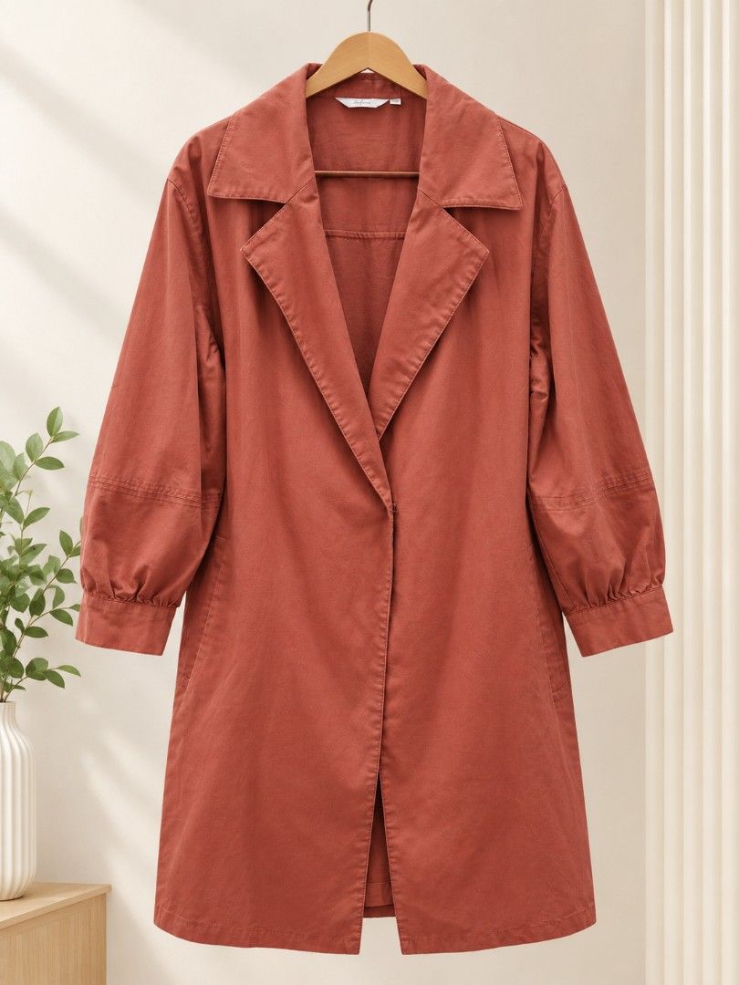Rust Colored Trench Coat with Wide Collar (Category: Coats, Jackets and Outerwear) located in Rizal. Submitted by mixierella (Listing ID 1460066246, Image 1). Description: Elevate your everyday style with this rust brown trench-inspired dress, featuring a sophisticated structured collar and classic button-front design. Its clean, timeless silhouette makes it an easy piece to dress up or down. ✨Features: - Rust-colored trench coat - Features a wid