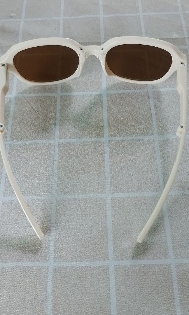 Sale!!!Foldable Sunglasses (Category: Sunglasses & Eyewear) located in Batangas. Submitted by zenrez_shop (Listing ID 1459990324, Image 3). Description: Anti UV 400 Foldable eyeglasses for women or men Color Beige frame brown tea lens.