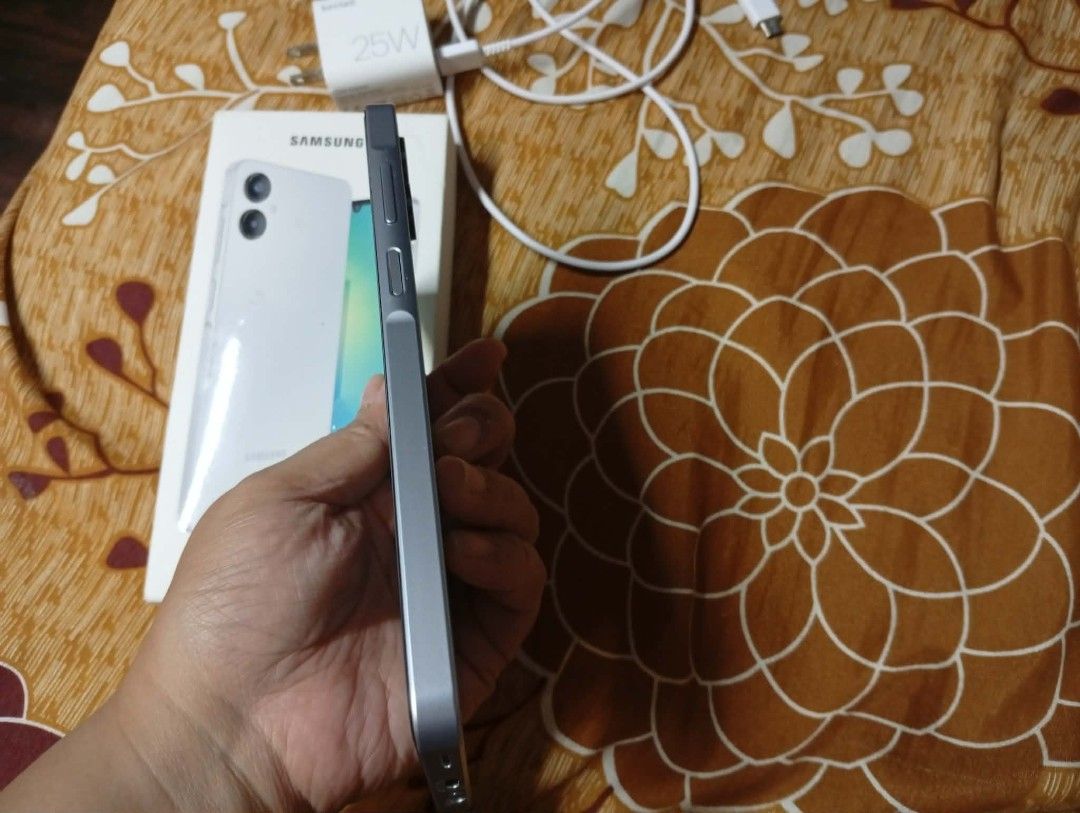 SAMSUNG A06 5G (Category: Samsung) located in Manila. Submitted by clemar121321 (Listing ID 1460028730, Image 2). Description: SAMSUNG A06 5G 4GB RAM 128 STORAGE WITH BOX WITH ORIGINAL CHARGER WITH PHONE CASE SMOOTH GAMITIN MALINAW BOTH CAM GLOBE LOCK LADY OWNED RFS: NEED FUNDS FOR MY BABY NA MAY CKD :( .