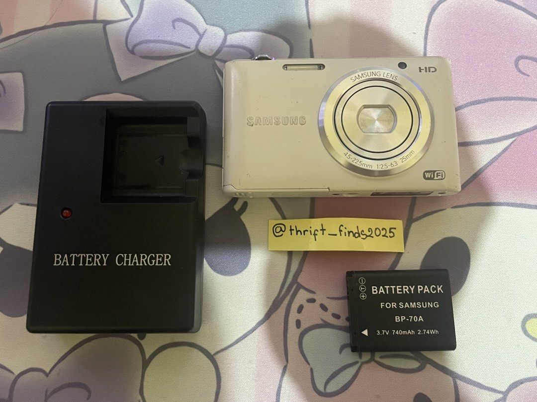 Samsung ST150F White vintage camera (Category: Cameras) located in Manila. Submitted by thrift_finds2025 (Listing ID 1459986827, Image 1). Description: 2500 can go 2k Issue: sd card reader sometimes if u want to get it fixed 1k sya sa quiapo Screen lcd (base on photo) output nit affected Shipping: jnt outside manila, lalamove if around manila (urs sf) .