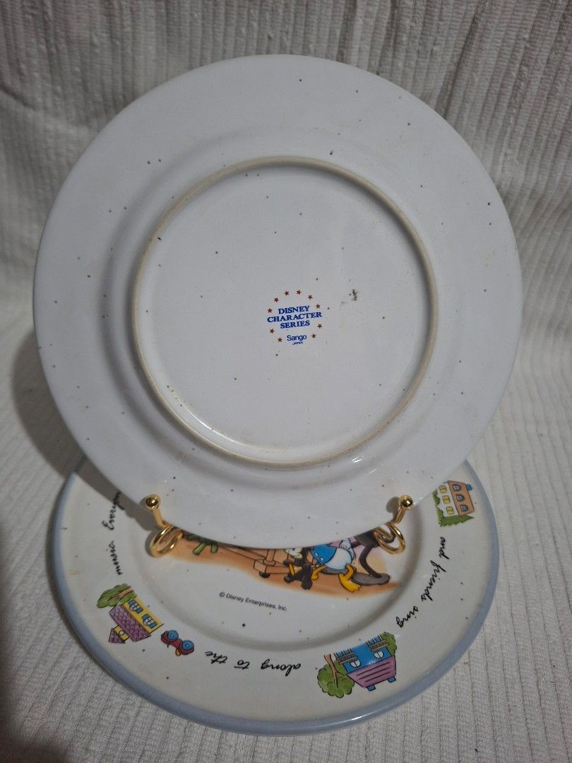 Sango Disney Mickey Mouse Ceramic Plate (Category: Other Kitchen Appliances) located in Consolacion. Submitted by luxekerei (Listing ID 1460029539, Image 3). Description: - vintage Disney Character Series ceramic plates made by Sango, featuring a party scene with Mickey and Minnie Mouse..