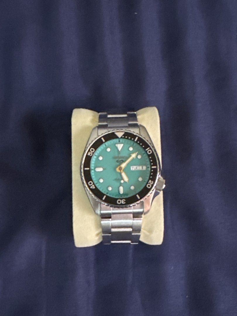Seiko 5 38mm - Teal (Category: Men's Watches) located in Paranaque City. Submitted by boogeycc (Listing ID 1459973686, Image 1). Description: - Seiko 5 Sports Watch - Striking Teal Dial - Rotating Bezel - Durable Stainless Steel Bracelet - Automatic Movement (No Battery Needed) - Day and Date Display - Ideal for Everyday Wear and Diving *RESIZED but never used.