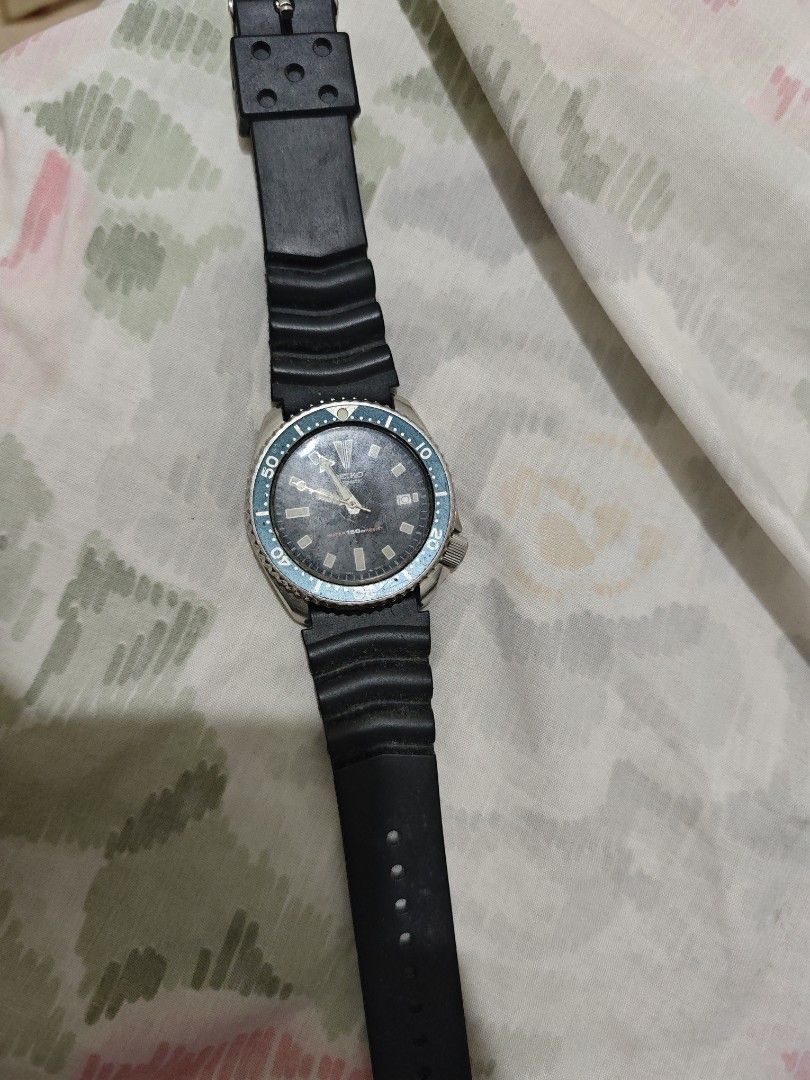 Seiko Automatic Dive Watch (Category: Men's Watches) located in Quezon City. Submitted by oddearth-46c4c8 (Listing ID 1459961177, Image 1). Description: - Seiko Automatic Dive Watch - Striking blue dial - Functional rotating bezel - Comfortable black rubber strap - Iconic Seiko wave logo on case back - Versatile: Ideal for everyday use or diving adventures.