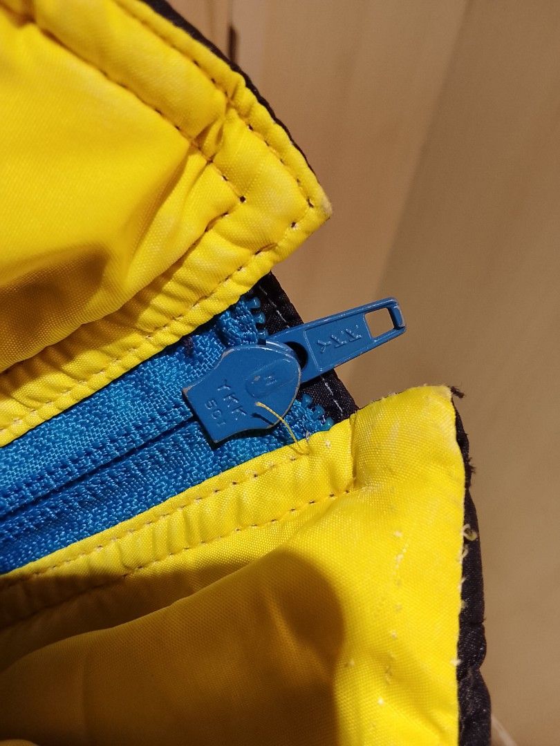 Sergio Tacchini Vintage Colour Block Ski Jacket (Category: Coats, Jackets and Outerwear) located in Manila. Submitted by newage.vintage (Listing ID 1459975936, Image 3). Description: - Vintage Sergio Tacchini ski jacket - Color block design: black, blue, yellow, and pink accents - Features a drawstring waist for a custom fit - YKK zipper closure - Ideal for winter sports or streetwear - A classic collectible piece.