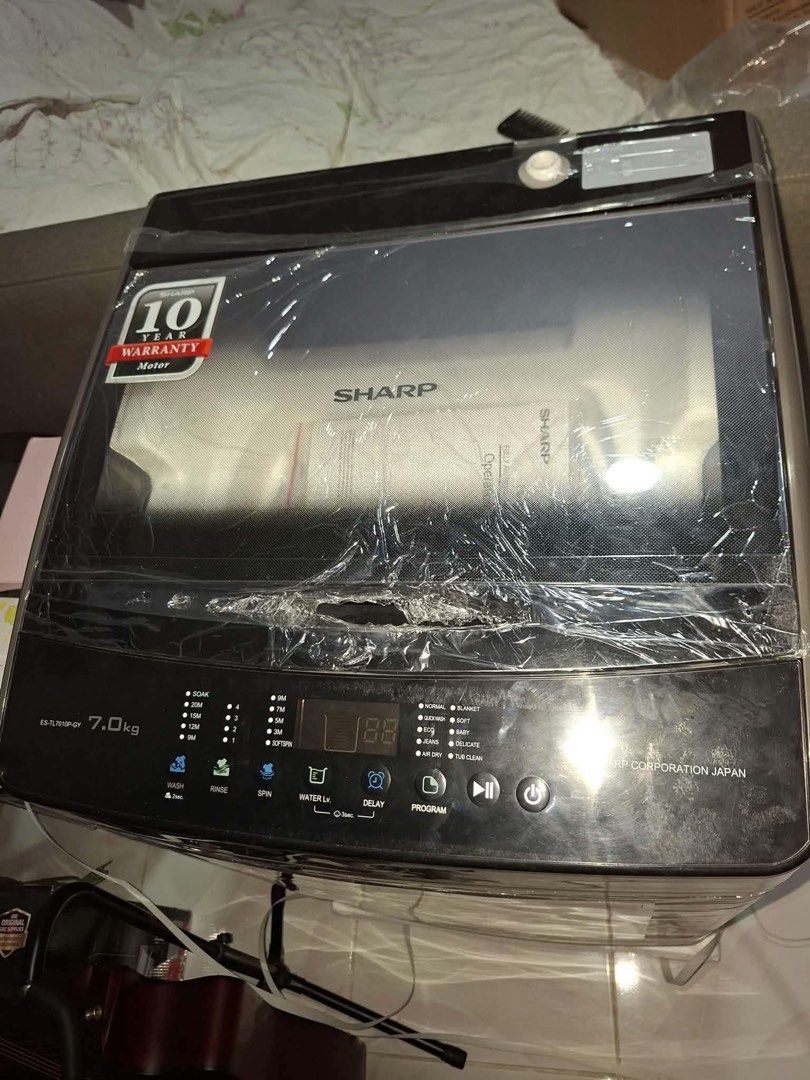 Sharp ES-TL7010P-GY 7.0kg Fully Automatic Washing Machine (Category: Washing Machines and Dryers) located in Manila. Submitted by sigmanigerian (Listing ID 1460046939, Image 3). Description: Brand New, haven’t been used RFS: Couldn’t bring it inside a condo due to management rules. Price is Negotiable MEET UP ONLY Location: 📍SM PAMPANGA Product Details: -Sharp Washing Machine - Model: ES-TL7010P-GY - Capacity: 7.0kg - Control: Micro Computer Pan