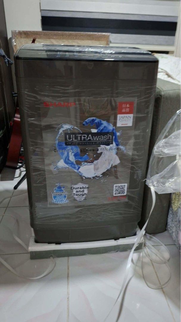 Sharp ES-TL7010P-GY 7.0kg Fully Automatic Washing Machine (Category: Washing Machines and Dryers) located in Manila. Submitted by sigmanigerian (Listing ID 1460046939, Image 2). Description: Brand New, haven’t been used RFS: Couldn’t bring it inside a condo due to management rules. Price is Negotiable MEET UP ONLY Location: 📍SM PAMPANGA Product Details: -Sharp Washing Machine - Model: ES-TL7010P-GY - Capacity: 7.0kg - Control: Micro Computer Pan