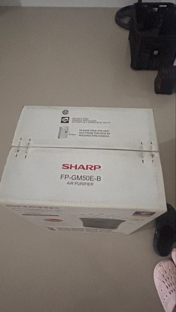 SHARP FP-GM50E-B Air Purifier with Mosquito Catcher (Category: Air Purifiers & Dehumidifiers) located in Bulacan. Submitted by markedson (Listing ID 1459900516, Image 2). Description: - Sharp FP-GM50E-B Air Purifier - Dual function: Air purification & Mosquito catcher - Advanced Plasmacluster Ion Technology - High-performance HEPA filter - Effective for rooms up to 40 sqm - Special Haze Mode for cleaner air - Enjoy a fresh, pest-free living space