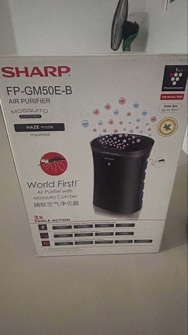 SHARP FP-GM50E-B Air Purifier with Mosquito Catcher (Category: Air Purifiers & Dehumidifiers) located in Bulacan. Submitted by markedson (Listing ID 1459900516, Image 1). Description: - Sharp FP-GM50E-B Air Purifier - Dual function: Air purification & Mosquito catcher - Advanced Plasmacluster Ion Technology - High-performance HEPA filter - Effective for rooms up to 40 sqm - Special Haze Mode for cleaner air - Enjoy a fresh, pest-free living space
