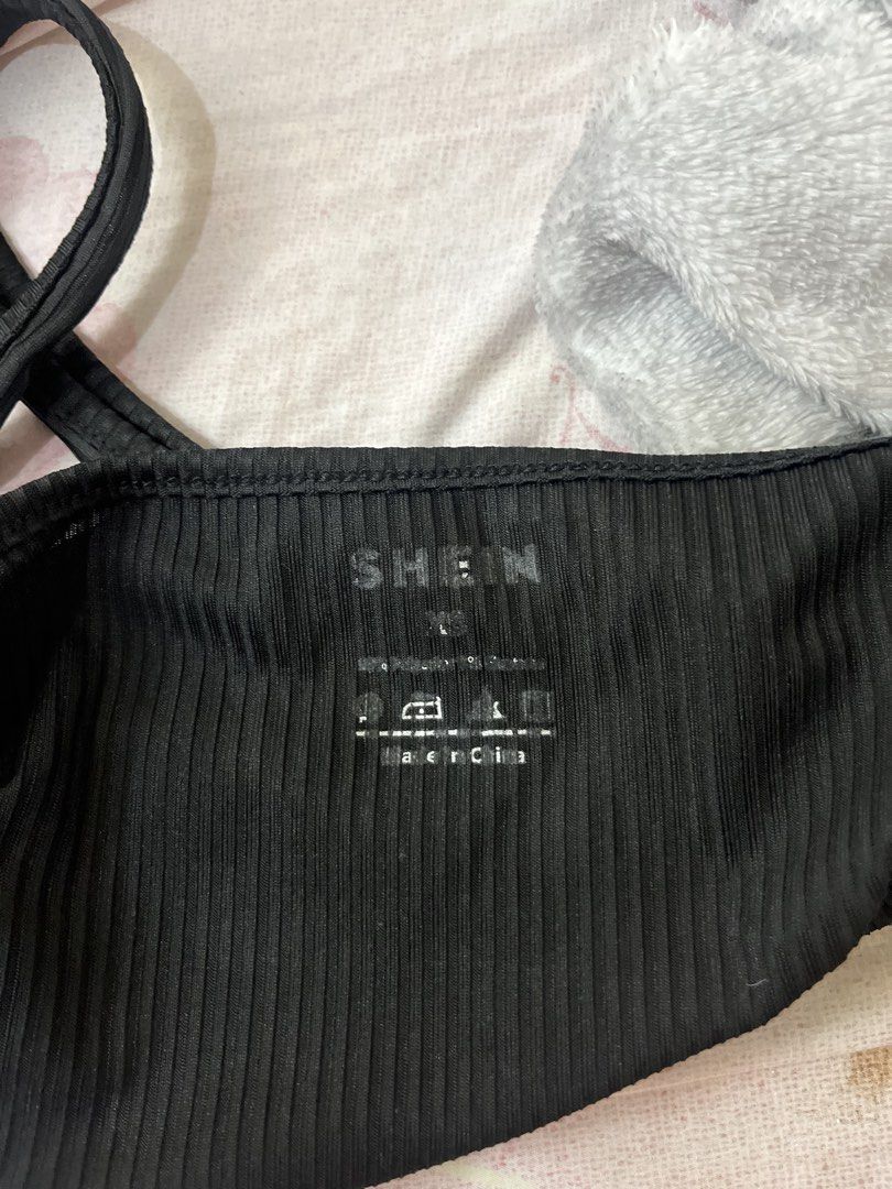 SHEIN Black Ribbed Halter Neck Crop Top (Category: Sleeveless) located in Manila. Submitted by gemini_gurll (Listing ID 1459922467, Image 2). Description: - SHEIN Black Ribbed Halter Neck Crop Top - Size: XS - Material: Stretchy - Versatile: Great for layering or wearing on its own - Easy to style: Pairs well with jeans or skirts - Comfortable and stylish.