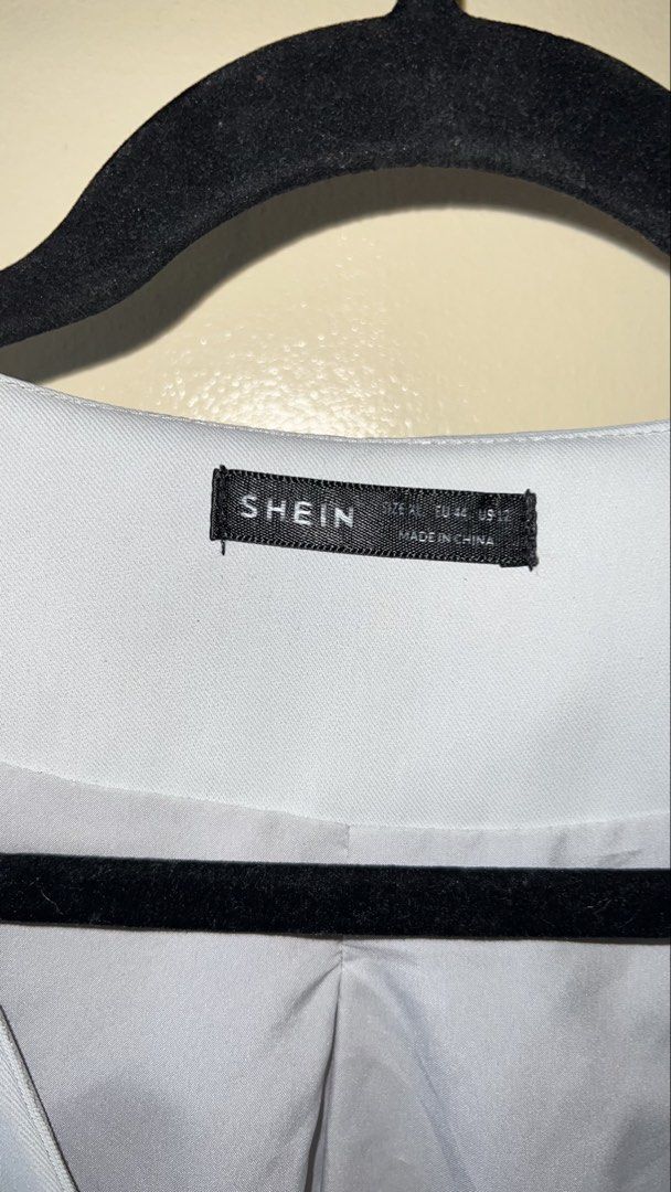 SHEIN Light Blue Button-Up Vest (Category: Sleeveless) located in Mandaluyong City. Submitted by chelseayb47224 (Listing ID 1459981633, Image 3). Description: - Light blue vest from SHEIN - Button-up front - Two pocket details - Versatile for layering over shirts or dresses - Classic design for smart casual looks.