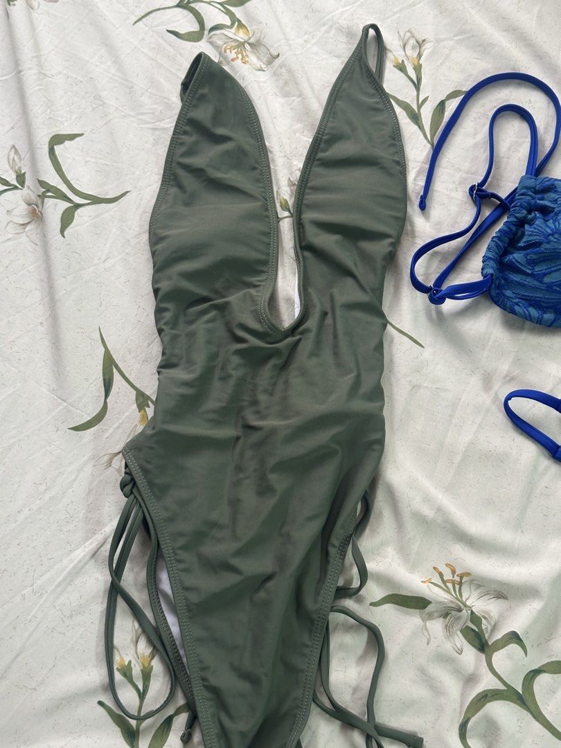 Shein Swimsuit Bundle (Category: Bikinis & Swimsuits) located in Marikina City. Submitted by kayy__closet (Listing ID 1459924734, Image 3). Description: - fits s-m - blue swimsuit set never used - for take all only.