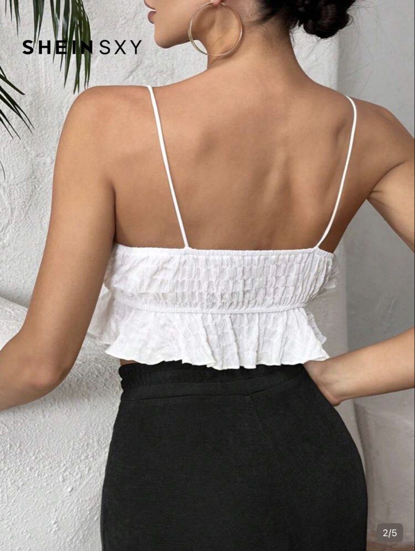 SHEIN SXY White Ruffle Crop Top (Category: Others Tops) located in Manila. Submitted by maggieberry (Listing ID 1460100010, Image 2). Description: - Cute white crop top - Features delicate ruffles - Spaghetti straps - Smocked back for a comfortable fit - Versatile: pairs well with high-waisted pants or skirts - Perfect for night outs or casual days - Trendy and stylish design.