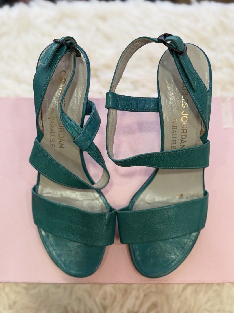 Short heels Sandals Green (Category: Heels) located in Makati City. Submitted by armyanna (Listing ID 1459971357, Image 2). Description: Barely used, just stored for a while. 🤎 Minor flaws are from storage over time, not actual wear. Still a lovely pair with plenty of life left! 👡✨.