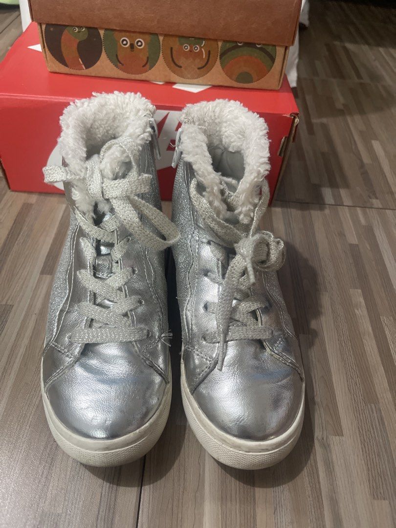 Silver Glitter High-Top Sneakers with Fur Lining (Category: Babies & Kids Fashion) located in Makati City. Submitted by eunice_tr (Listing ID 1459937377, Image 1). Description: - Eye-catching sparkly silver high-top sneakers - Cozy white fur lining for ultimate warmth - Secure lace-up front closure - Ideal for keeping feet toasty and fashionable - Perfect for everyday casual wear.