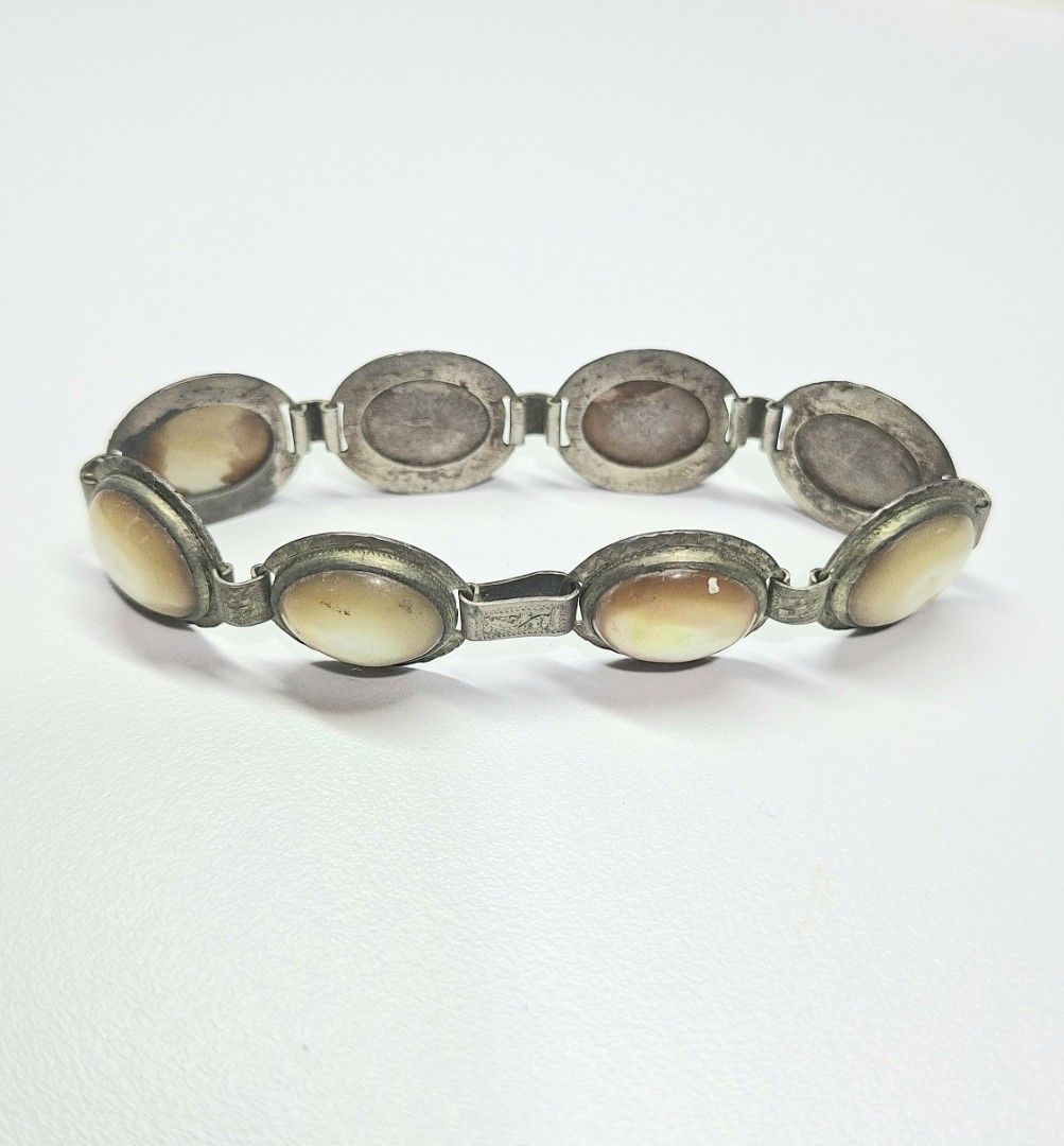 Silver (No Mark) Bracelet with Oval Shaped Stones (Category: Bracelets) located in Makati City. Submitted by archaic532shop (Listing ID 1460023788, Image 3). Description: ■Approximate Dimensions: L-17.5 cm IMPORTANT NOTES: • Clients with OFFERS will be prioritized. • Selling in “As Is “condition (no warranty or guarantees) Accept all flaws before and after purchase. No returns. No exchange of items. • All items are pre-owned unless declared New •