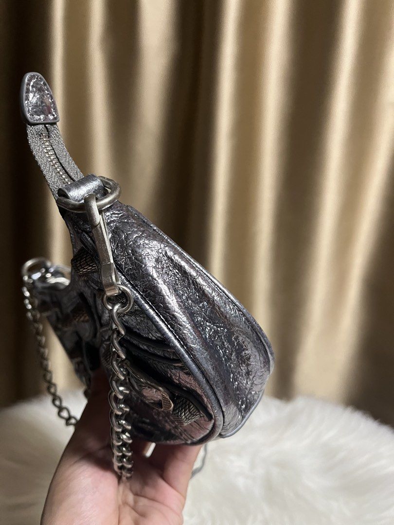 Silver Studded Shoulder Bag with Chain Strap (Category: Shoulder Bags) located in Pasay City. Submitted by 2ndloveforever2023 (Listing ID 1460089486, Image 3). Description: Japan Source coded rank AB lampo zipper .