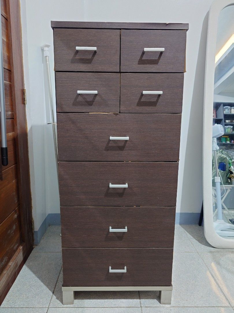 Slim drawer (bought from Japan Surplus) (Category: Shelves, Cabinets & Racks) located in Taguig. Submitted by ggreatfindsph (Listing ID 1460097887, Image 2). Description: Selling 6-layer slim drawer cabinet. Issue: Some laminate/edge peeling due to prolonged high humidity and had history of molds nung sunod sunod yung ulan, but still sturdy and functional. Selling as-is. I can send more pics upon request :) Dimensions: 19x45x16 inches Kayo po mag