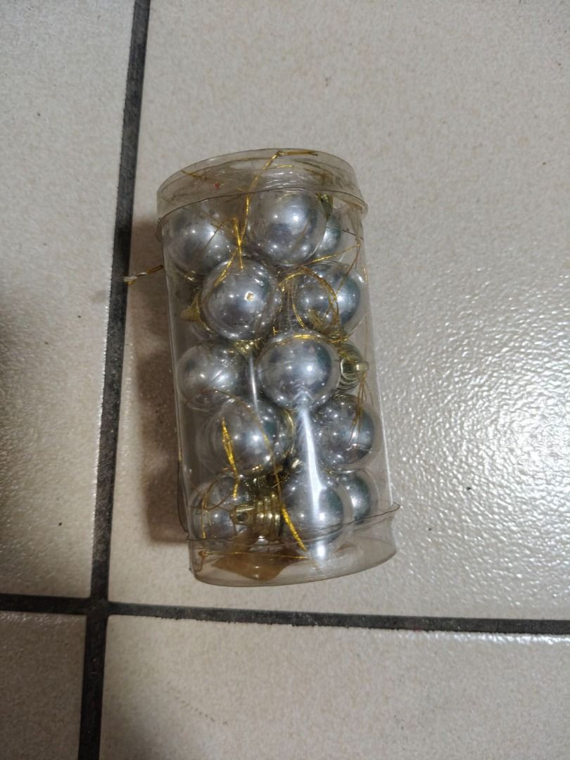 Small Silver Christmas Balls (Category: Other Home Decor) located in Quezon City. Submitted by oddduck02 (Listing ID 1459913750, Image 3). Description: - Small Christmas Balls for Christmas Tree - Color: Silver - Perfect for decorating specially this Christmas - Reason for selling - Cleaning house - Number of Pieces = 36pcs. - Approximate Size = 1in. Long / 2cm. Diameter .