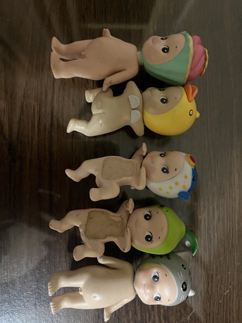 Sonny Angel Dolls - Assorted Series (Category: Designer & Blind Box Toys) located in Makati City. Submitted by aliyahprieto949 (Listing ID 1460027692, Image 1). Description: - Set of 5 Sonny Angel dolls - Includes duck, pear, cat, and two other designs with different hats - Ideal for Sonny Angel collectors - Also great as cute decorative pieces - Sold as a complete set of 5.