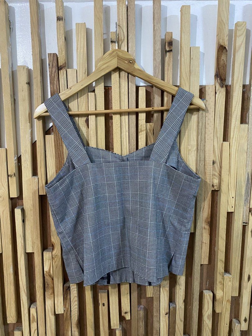 SPAO Plaid Button Front Crop Top Size S (Category: Blouses) located in Angeles City. Submitted by calmrabbit.ae2127 (Listing ID 1459976646, Image 2). Description: - Cute plaid crop top from SPAO - Features a button front - Wide straps - Made from a polyester blend - Versatile for casual outings or dressing up.
