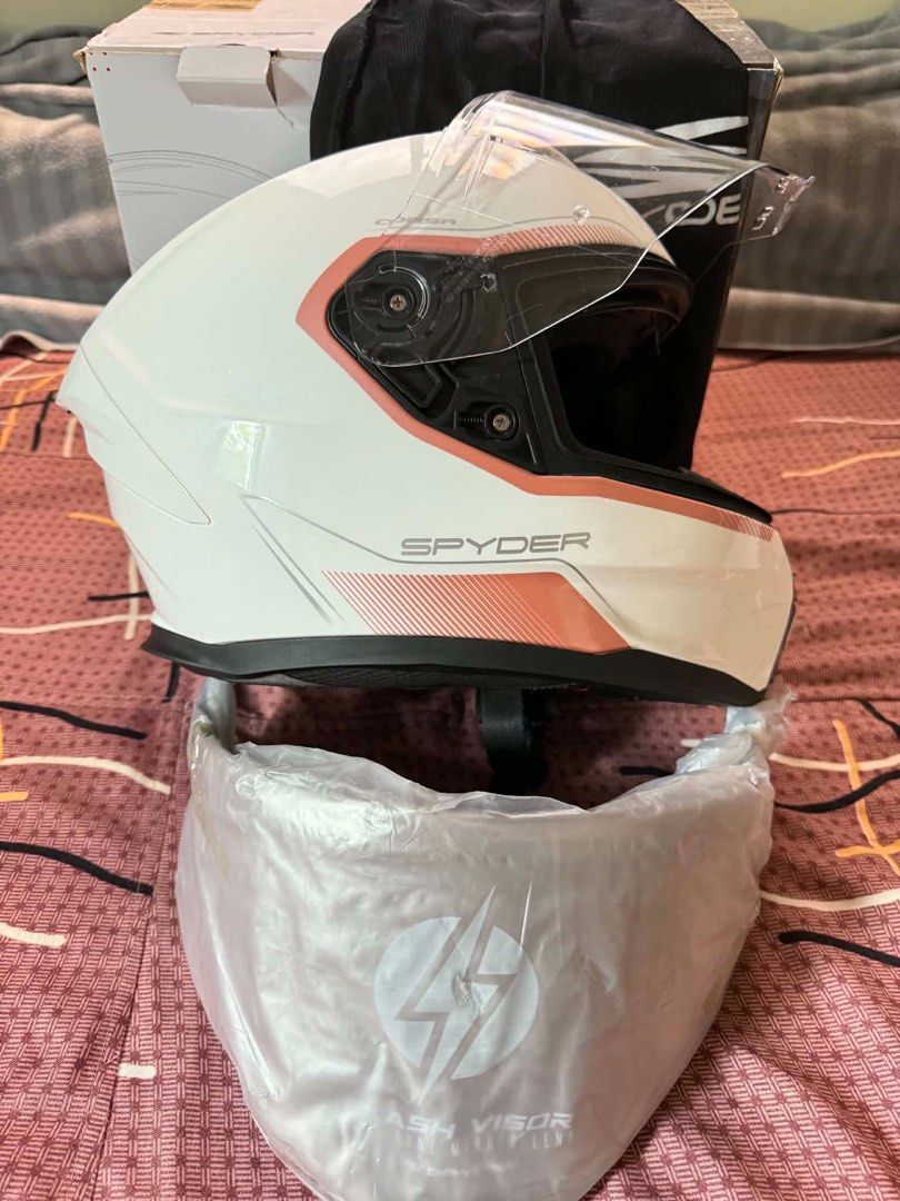 Spyder Corsa Motorcycle Helmet with Extra Visor (Category: Helmets and other Riding Gears) located in Manila. Submitted by fiercewind.83d126 (Listing ID 1459922689, Image 3). Description: - White Spyder Corsa Helmet - Includes installed clear visor + 1 additional clear visor - Comes with helmet bag and original box - Perfect for your motorcycle rides.