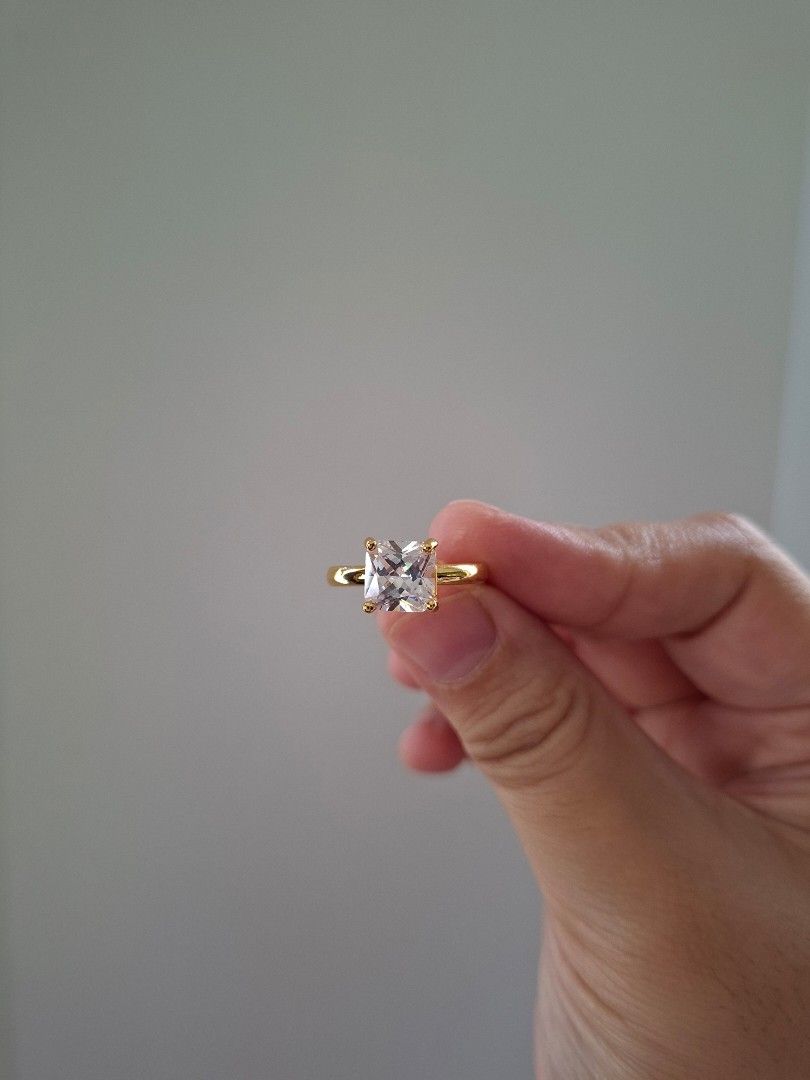 Square Cut Stone Adjustable Gold Ring (Category: Rings) located in Dasmarinas. Submitted by danabrie22 (Listing ID 1460027944, Image 2). Description: very well-made, excellent crafstmanship 10/10 condition - adjustable size 5 - 9 brand new stainless steel & cubic zirconia stones.