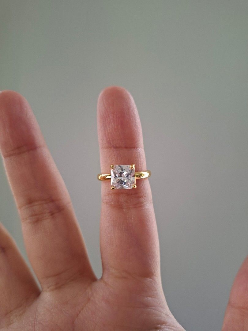 Square Cut Stone Adjustable Gold Ring (Category: Rings) located in Dasmarinas. Submitted by danabrie22 (Listing ID 1460027944, Image 1). Description: very well-made, excellent crafstmanship 10/10 condition - adjustable size 5 - 9 brand new stainless steel & cubic zirconia stones.