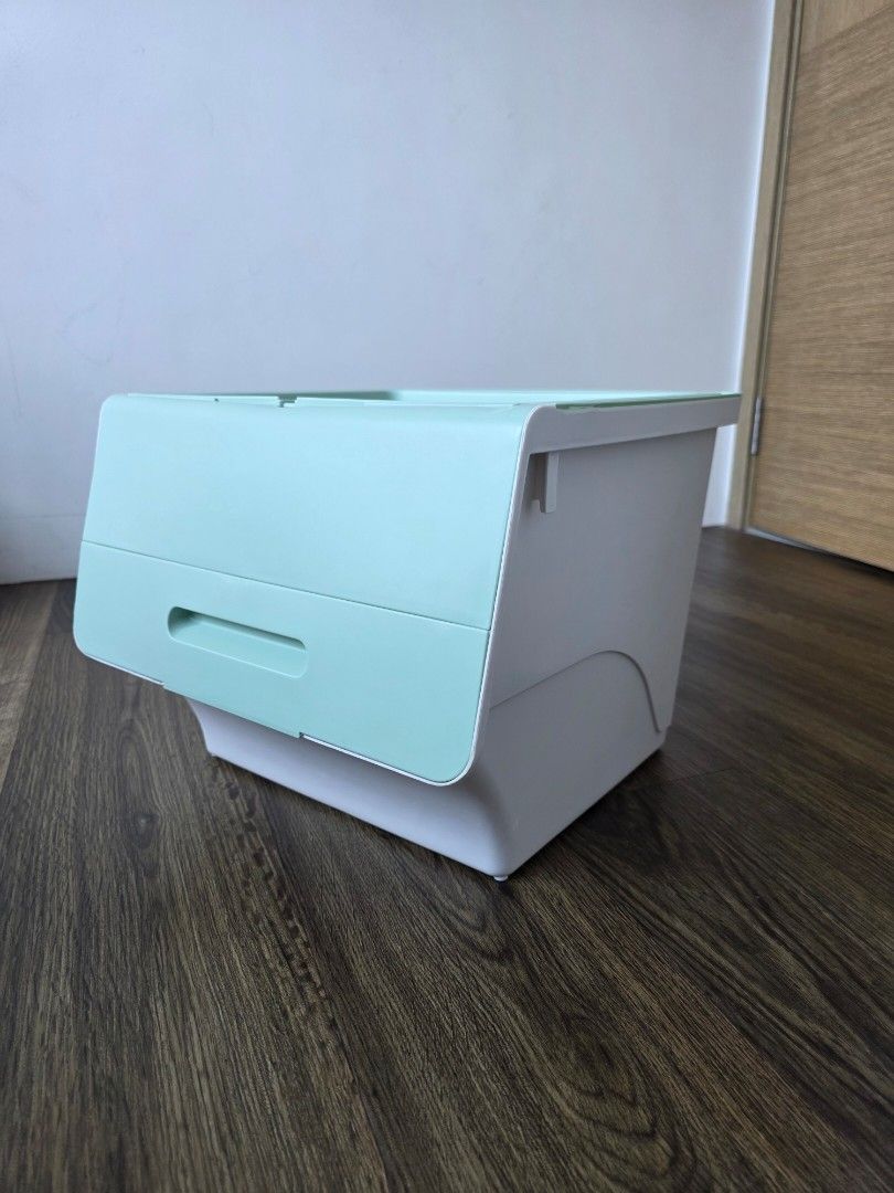 Stackable Storage Boxes with Lids (Category: Storage Boxes & Baskets) located in Singapore. Submitted by maximami (Listing ID 1459919113, Image 3). Description: 2 light green storage boxes. (no yellow box) 1 box: $5 2 boxes at $10. (Originally bought at $24 for both boxes.) Top up $8 for all soft toys shown in last picture - lightweight - They have flip-up lids for easy access. - Great for organizing toys, clothes, or other household items. - Can