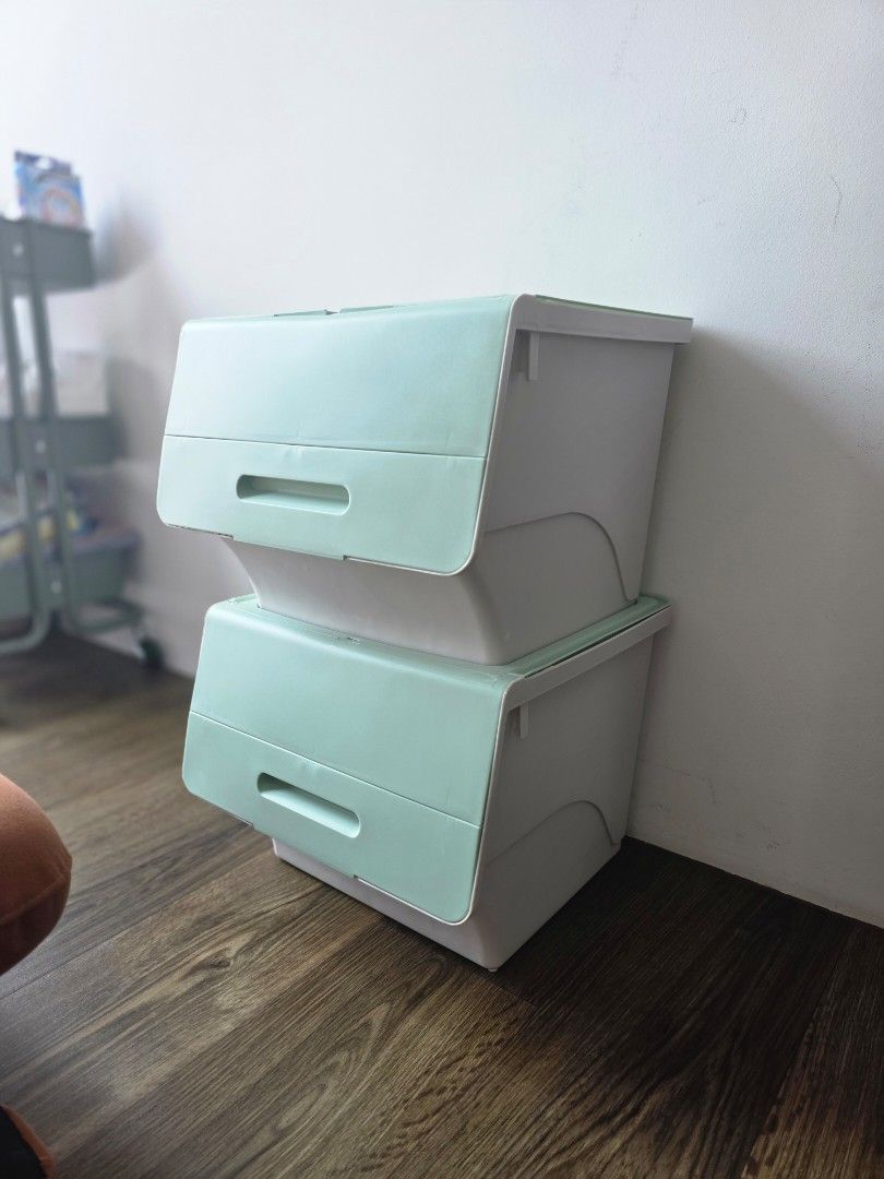 Stackable Storage Boxes with Lids (Category: Storage Boxes & Baskets) located in Singapore. Submitted by maximami (Listing ID 1459919113, Image 2). Description: 2 light green storage boxes. (no yellow box) 1 box: $5 2 boxes at $10. (Originally bought at $24 for both boxes.) Top up $8 for all soft toys shown in last picture - lightweight - They have flip-up lids for easy access. - Great for organizing toys, clothes, or other household items. - Can