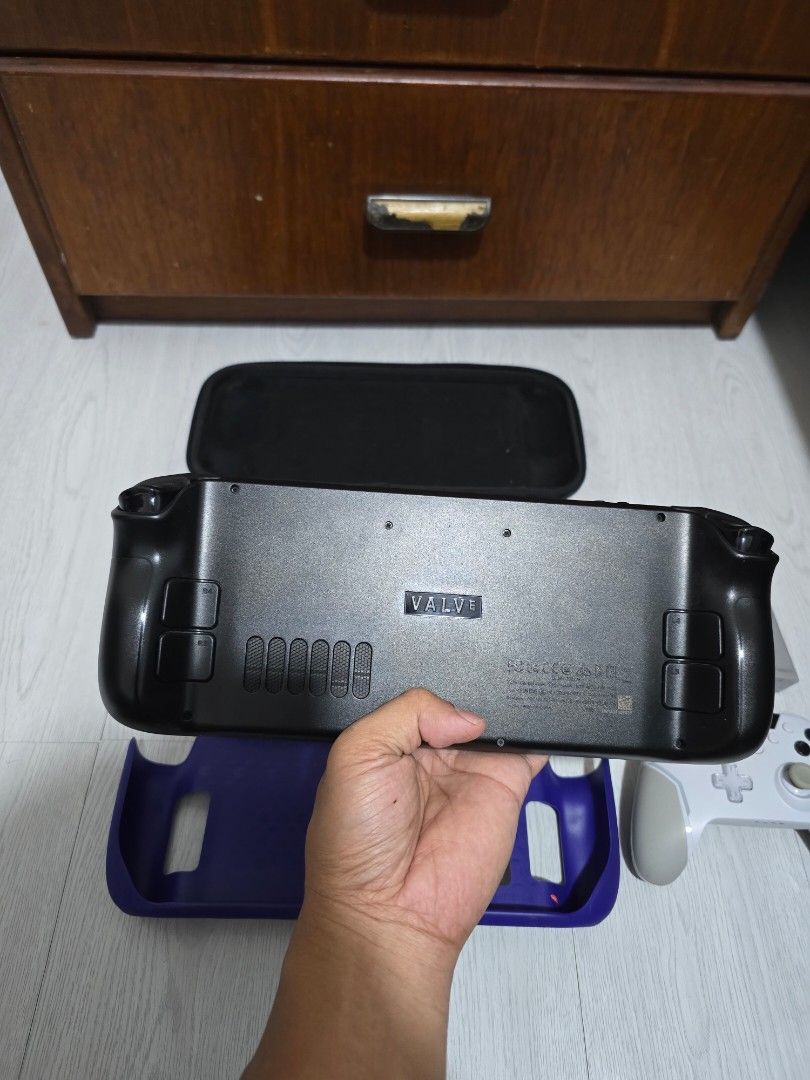 Steamdeck lcd 512GB (Category: Others) located in Caloocan City. Submitted by jesonvillegas (Listing ID 1459974089, Image 3). Description: 🔥 FOR SALE — STEAMDECK 512GB (256GB variant with 256GB sd card 100% BATTERY HEALTH 🔥 ━━━━━━━━━━━━━━━━━━ 💰 PRICE: 🔥 20,995 fixed price ━━━━━━━━━━━━━━━━━━ 📦 INCLUSIONS: ✅ Charger ✅ Case ✅ pouch ✅ easysmx x20 wireless controller ━━━━━━━━━━━━━━━━━━ 🎮 SHARED GAMES: • The Last of Us • Red Dead Redemption 2 • T
