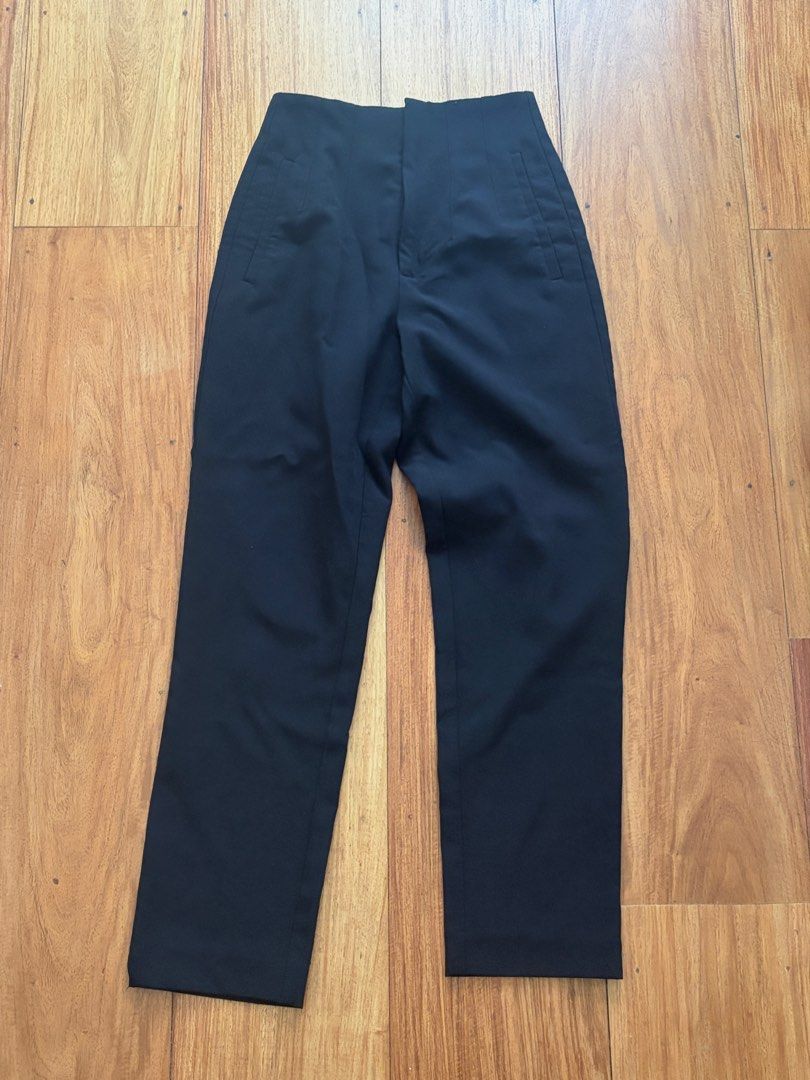 Stradivarius Black High Waisted Tailored Trousers (Category: Other Bottoms) located in Pasig City. Submitted by riikawa (Listing ID 1459932882, Image 2). Description: - Brand: Stradivarius - Color: Black - Fit: High-waisted, tailored - Leg Style: Straight leg - Closure: Button and zip front - No pockets - Origin: Made in Cambodia - Versatile: Great for work or a night out.