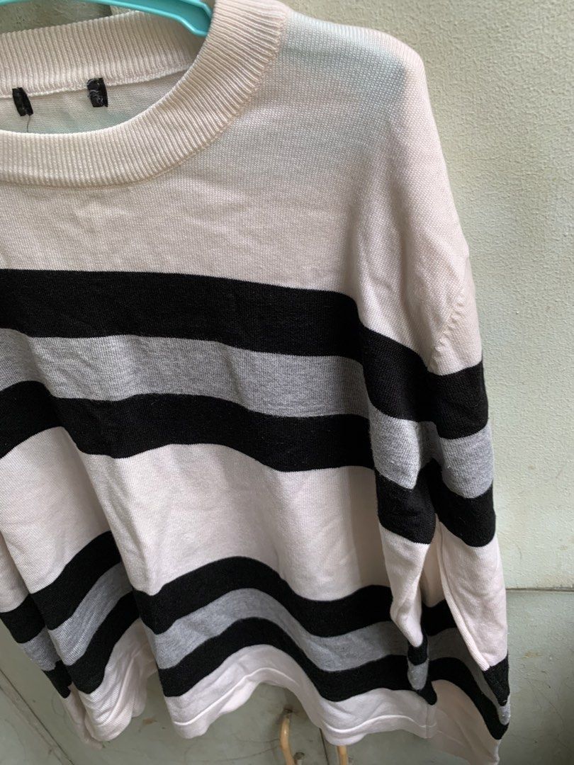 Striped Long Sleeve Sweater (Category: Longsleeves) located in Manila. Submitted by usagichan_rabbit (Listing ID 1459945288, Image 2). Description: - Cream sweater with black and grey stripes - Long sleeves - Crew neck - Comfortable knit material - Versatile for layering or wearing on its own - Easy to pair with jeans or skirts - Classic striped design Nahawaan ng color pink not sure if maalis pa.