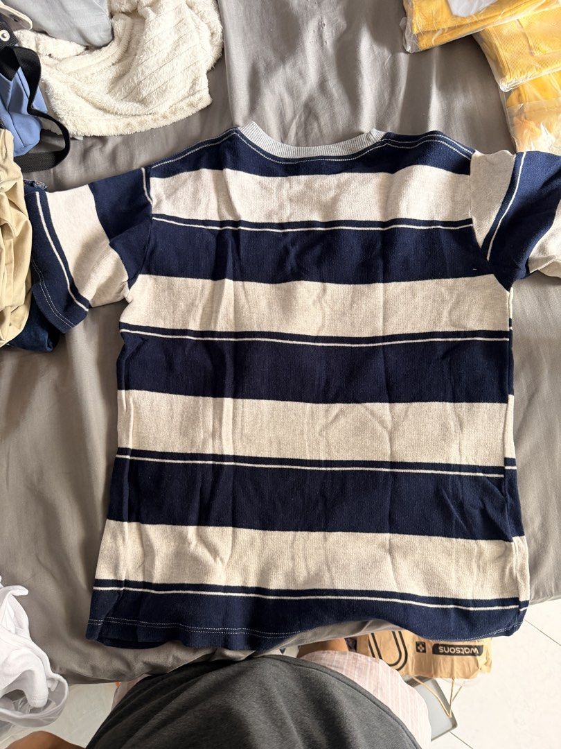 Striped T-shirt (Category: Tshirts & Polo Shirts ) located in Manila. Submitted by ellede32655 (Listing ID 1459971531, Image 2). Description: - Classic blue and white stripes - Short sleeves - Crew neck - Comfortable fabric, perfect for everyday wear - Easy to pair with jeans or shorts - Simple and versatile design.