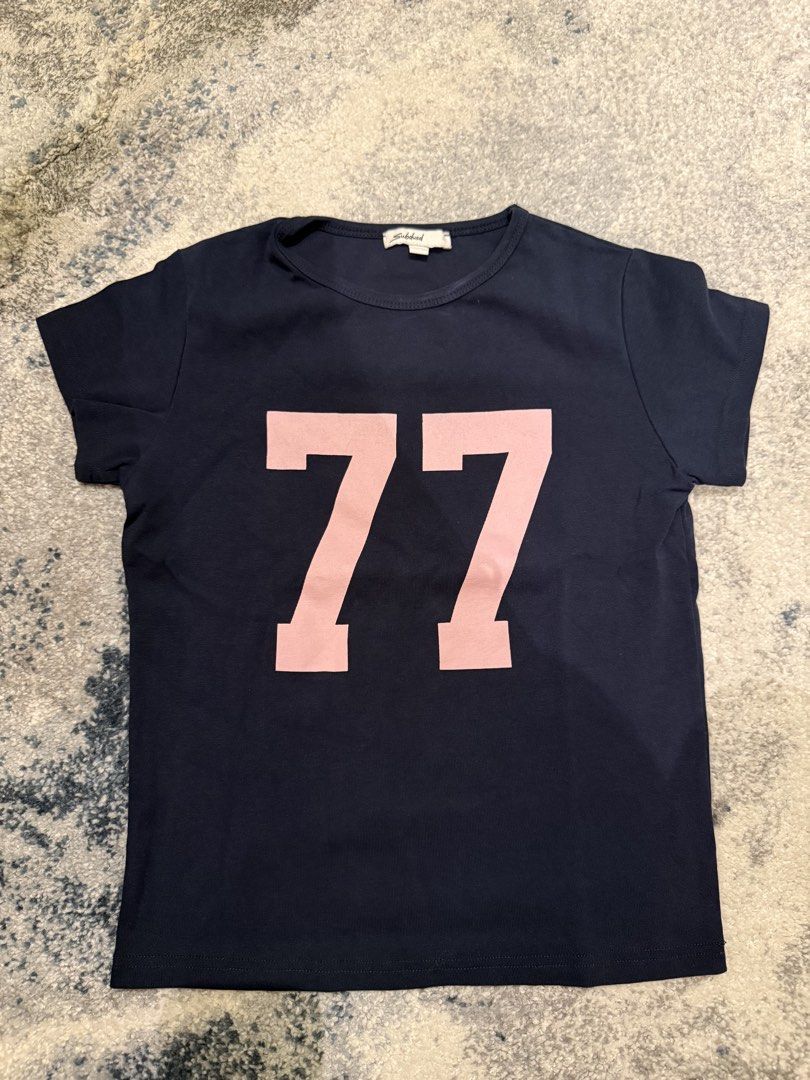 Subdued 77 Baby Tee (Category: Shirts) located in Manila. Submitted by ell4scloset (Listing ID 1459978287, Image 1). Description: - worn once - bought from a shanghai pasabuy - love the cut of the shirt its just right! Very chic Rfs: decluttering.
