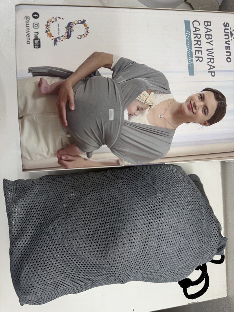Sunveno Baby Wrap Carrier Breathable Grey (Category: Carriers & Slings) located in Pasig City. Submitted by cvj25 (Listing ID 1459947340, Image 2). Description: - Sunveno Baby Wrap Carrier - Made with breathable fabric for maximum baby comfort - Includes a convenient grey mesh bag for easy storage and portability - Simple and easy to use for hands-free baby carrying.
