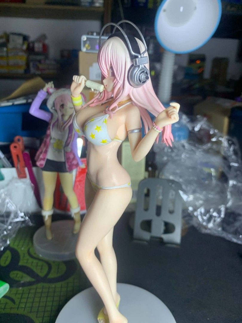 Super Sonico Summer Beach yellow ver. (Category: Designer & Blind Box Toys) located in Dipaculao. Submitted by zorotoyz (Listing ID 1459824390, Image 3). Description: BIB no clam yellow version complete accessories Issue putol sa kamay nya yung peg ng sunglasses. At Yung lower bikini part to legs or sing3t naka ang@t nid I glue.